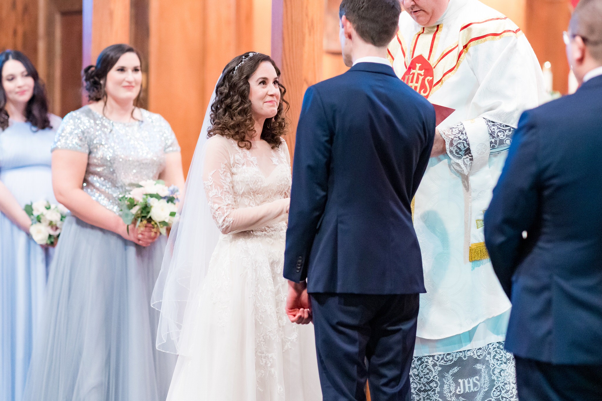 An intimate wedding at Paesanos & Our Lady of the Atonement Catholic Church by Dawn Elizabeth Studios, San Antonio Wedding Photographer